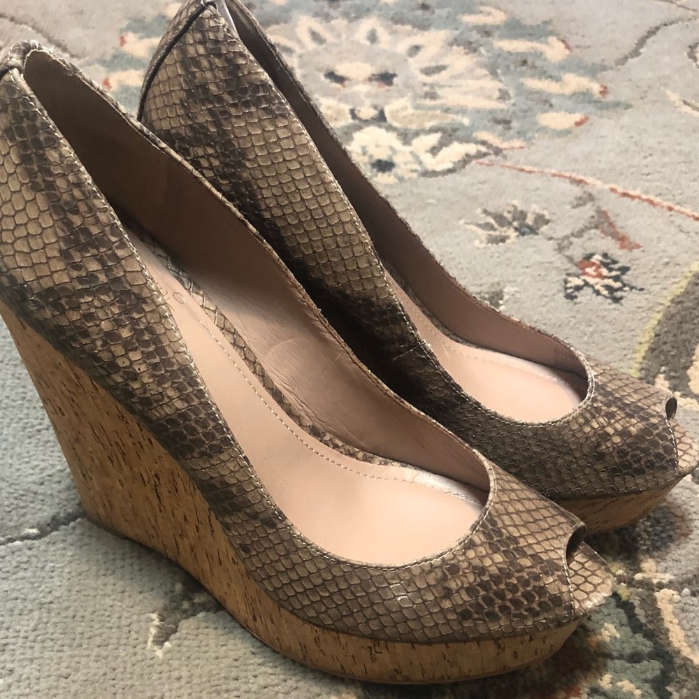 Vince Camuto snakeskin, peep-toe wedges.